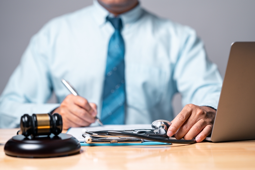 Lawyer reviewing medical records in a Pennsylvania workers’ compensation case