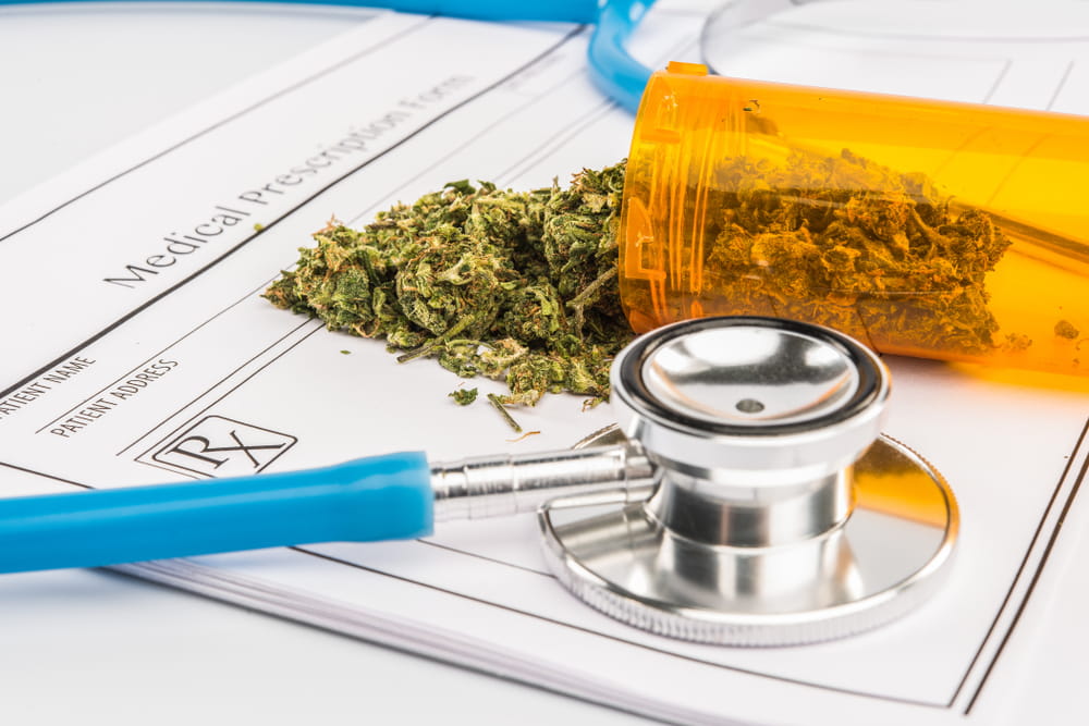 Medical marijuana prescription and stethoscope representing workers&rsquo; compensation coverage in Pennsylvania